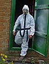 Man wearing protective suit